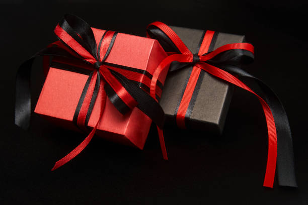 istock Black friday sale concept with gift box with ribbon 1339844427