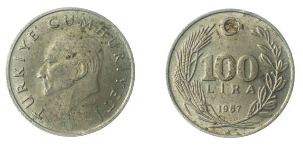 istock Turkey 100 lira coin on a white isolated background 1339844630