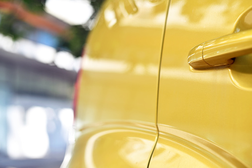 Close-up of a yellow car, Europe.