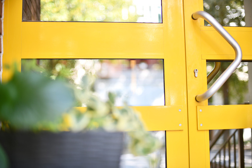 Close-up of yellow doors, Europe.