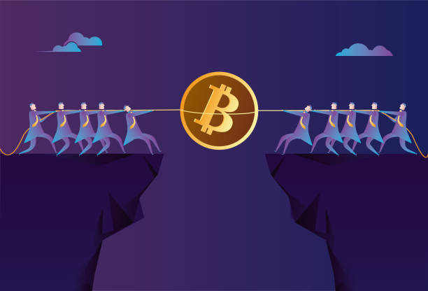 istock Two teams compete for Bitcoin in a tug-of-war on the cliff 1339847597