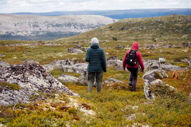 istock Two women hiking on a mountain plain 1339855203