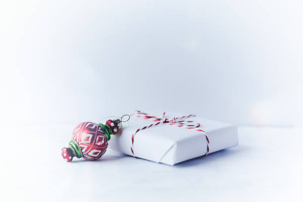 istock Christmas present on bright background. Close up. Copy space. 1339858337