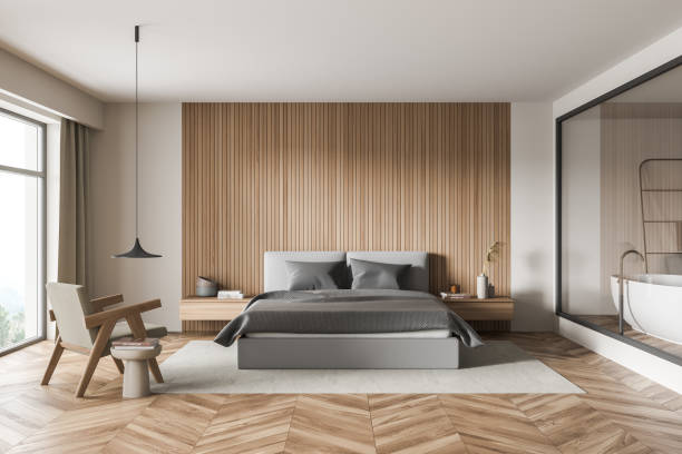istock Panoramic bedroom with light beige walls and glass partition 1339859776