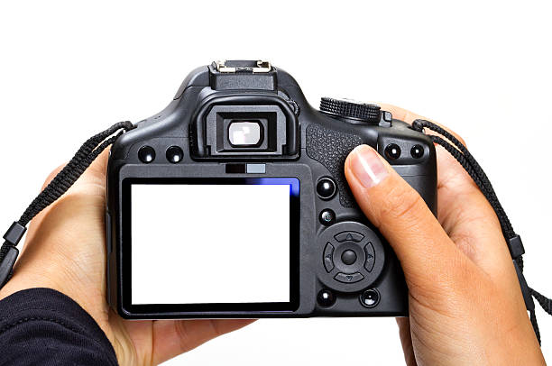 istock DSLR camera in female hands 133986294