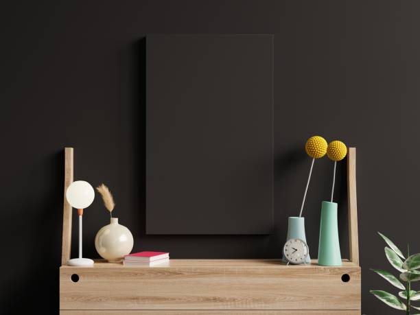 istock Mockup black poster in living room interior on empty dark wall background. 1339863024