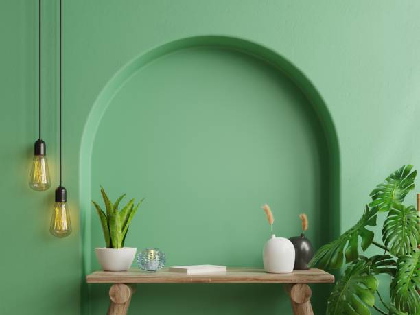 istock Interior wall mockup,Green wall and wooden table. 1339863036