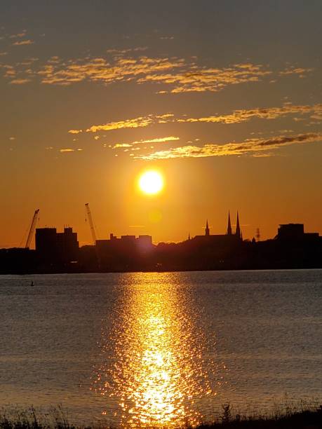 istock Orange sunset over the city 1339864060