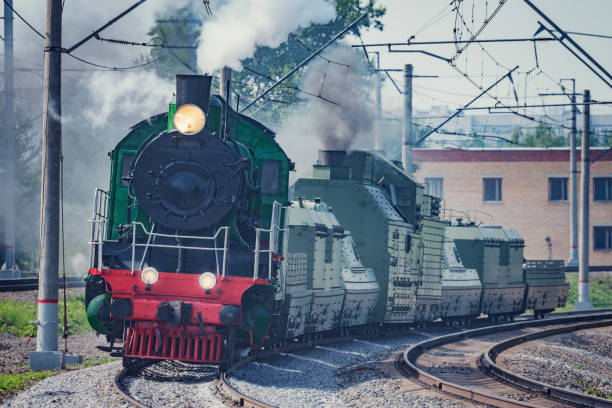 istock Armoured retro steam train moves. 1339868922
