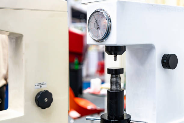 istock diamond head pin and adjustment move up down table of hardness tester machine for inspection property hardness value of specimen sample material or product 1339874377