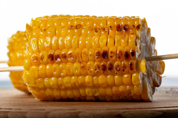 istock cobs of sweet boiled and gil-fried corn isolated on white background 1339874413