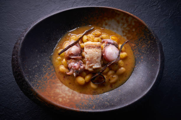 istock Judias pochas beans with calamari 1339885419