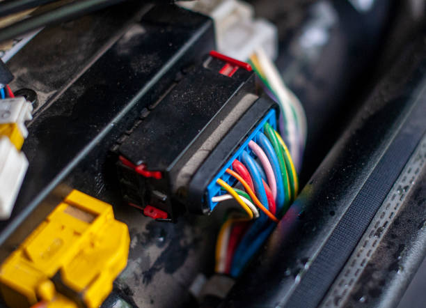 istock Automobile block with colorful wires. Car service. 1339887172