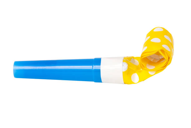 istock Rolled festive noisemaker or party whistle horn on the white isolated 1339889580