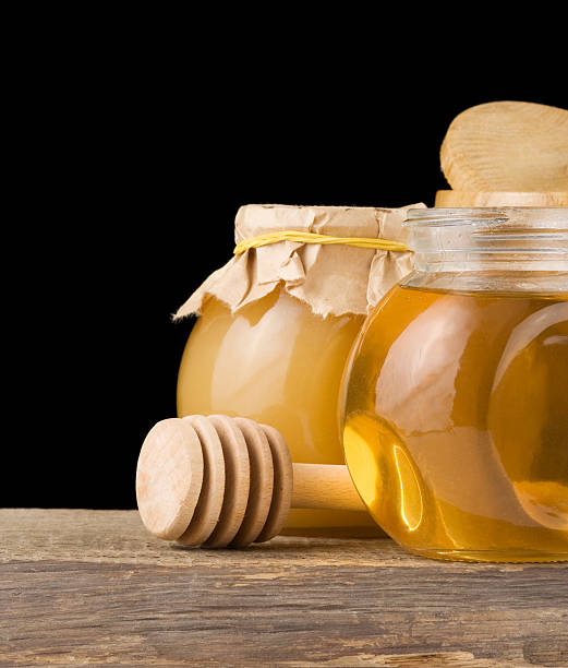 istock jar full of honey and stick 133989748