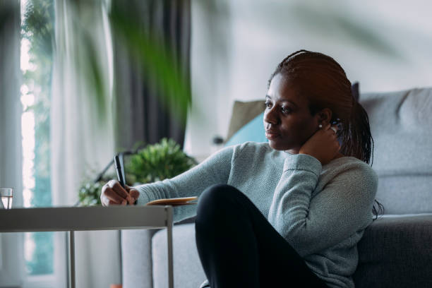 Women in Business: Beautiful Businesswoman Using a Laptop while Working from Home