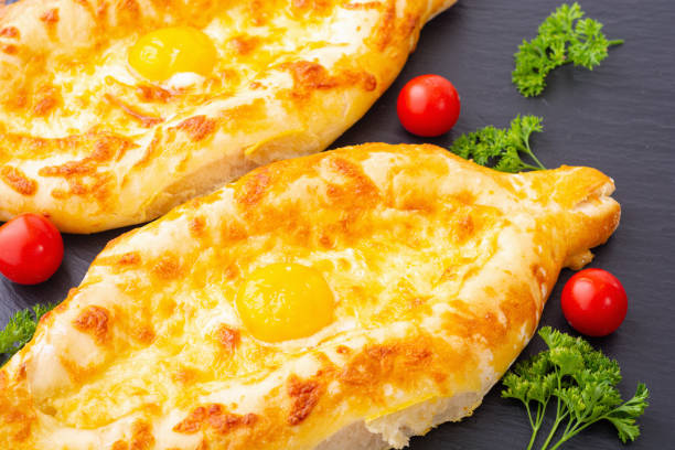istock Homemade adjarian khachapuri with egg 1339910572