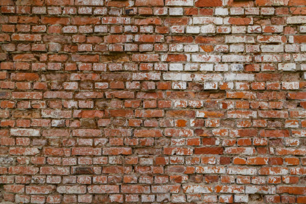 istock flat brick wall with moss and whitewash leftovers full frame background and texture 1339914866