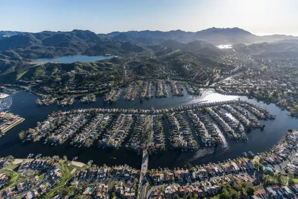 Aerial view of lakeside homes and street in the Thousand Oaks and Westlake Village communities in Southern California.