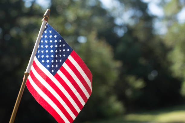 American Flag outside on a beautiful sunny day. stock photo