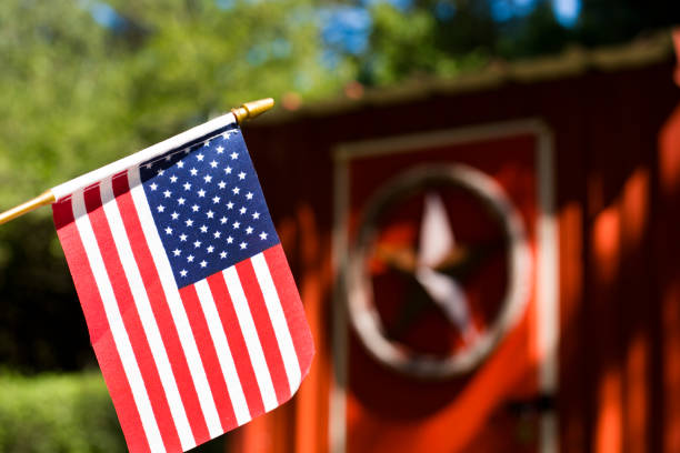 istock American Flag outside on a beautiful sunny day. 1339927335