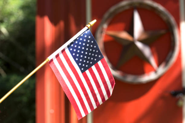 istock American Flag outside on a beautiful sunny day. 1339927358
