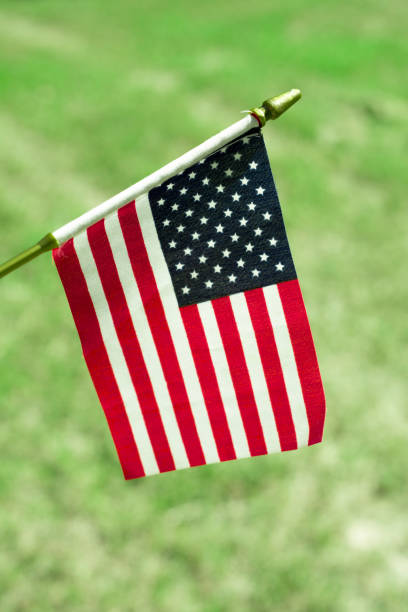 istock American Flag outside on a beautiful sunny day. 1339927454