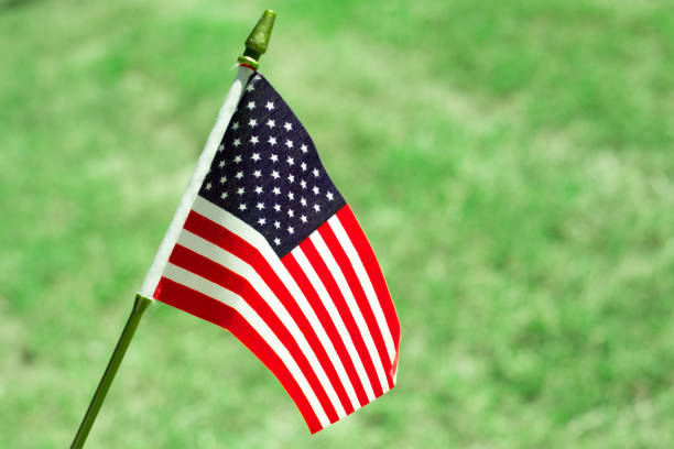 istock American Flag outside on a beautiful sunny day. 1339927490