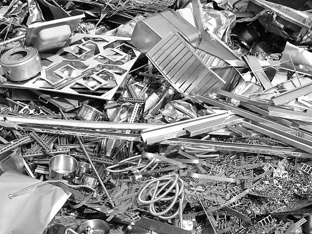 Photo of Close up photo of silver color scrap metal and metal trash