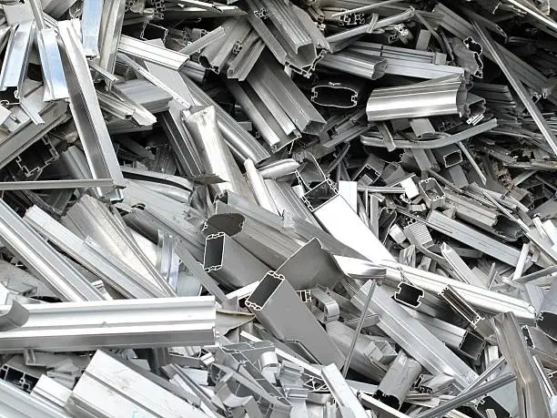 Photo of Scrap metal pieces laying in a pile