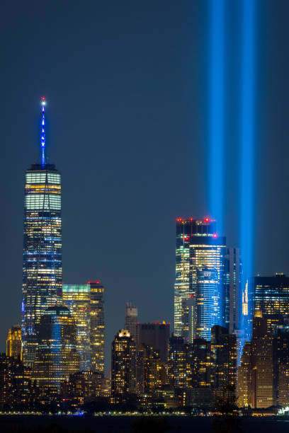 Tribute in Light and WTC from the Teardrop Memorial Tribute in Light and WTC from the Teardrop Memorial to the struggle against world terrorism statue photos stock pictures, royalty-free photos & images