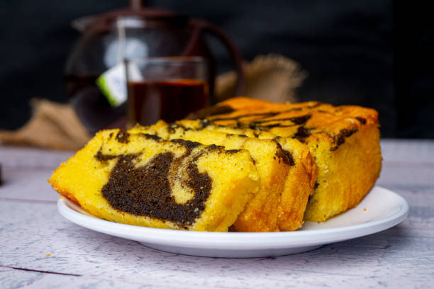 marmer cake, indonesian food, on white plate - marmer imagens e fotografias de stock