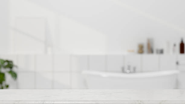 istock Mockup space for montage on white marble tabletop over bright modern bathroom, 3d rendering 1339942181