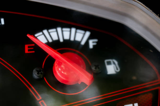 istock fuel gauge with arrow red indicator level (selective focus) 1339950505