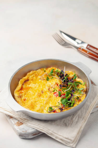 istock Omelette with vegetables - shakshuka in skillet 1339950867