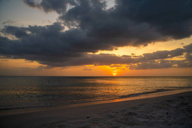 istock The sun sets at a beach in Naples, Florida 1339952368