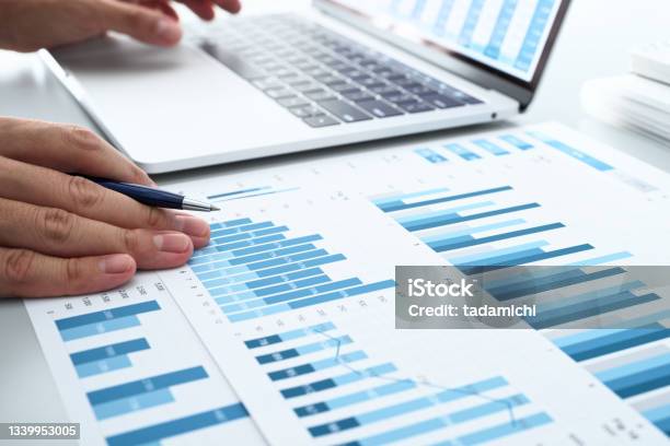 Analyzing Business Accounting Stock Photo - Download Image Now - Chart, Desk, Laptop