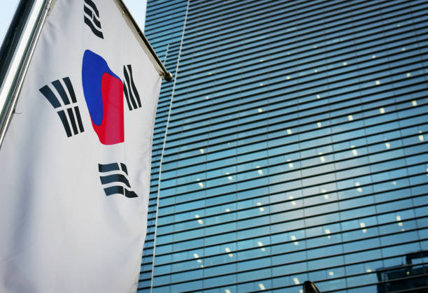 Taegeukgi hanging on the exterior wall of an apartment on National Day