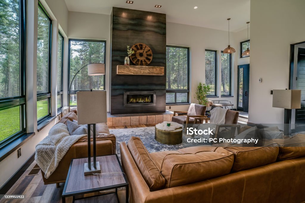 Linear electric fireplace in family room Open floor plan with room to host friends and family Living Room Stock Photo
