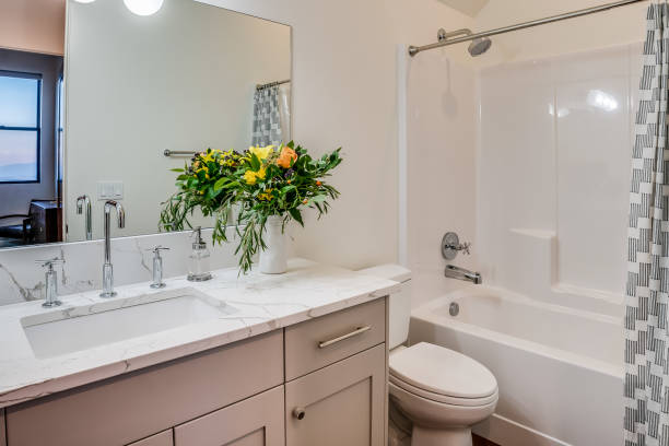 istock Natural wood cabinets in bathroom 1339958348