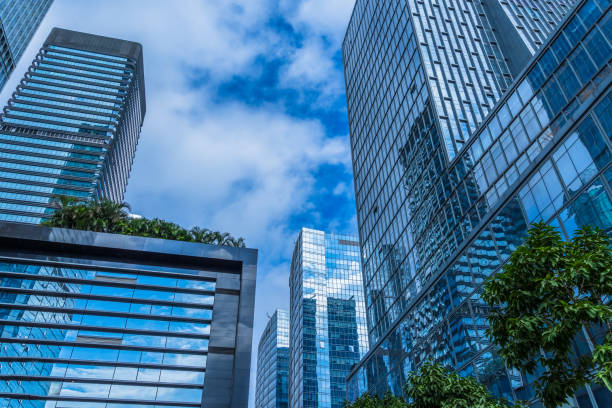 istock Modern office building on a clear sky background 1339961072