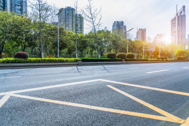 istock empty urban road with modern building in the city 1339961081