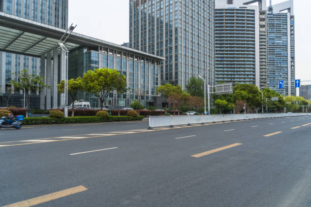 istock empty urban road with modern building in the city 1339961088