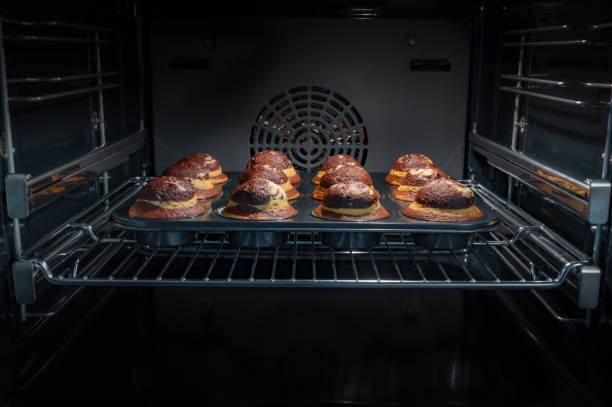 istock Chocolate muffins in oven 1339961582