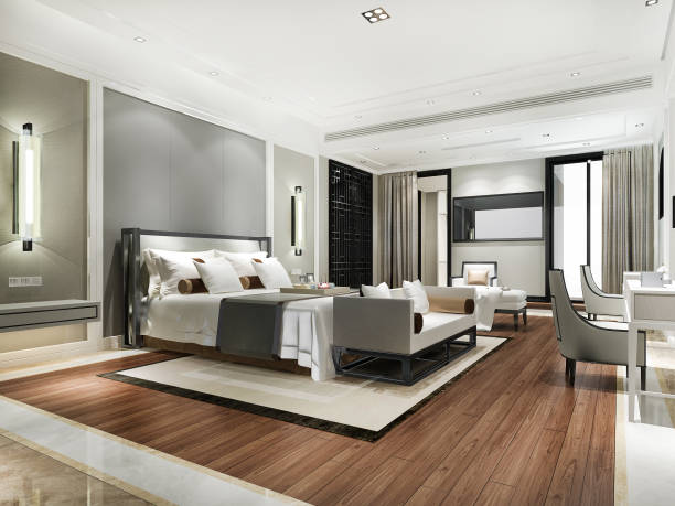 istock 3d rendering beautiful comtemporary luxury bedroom suite in hotel with tv and sofa 1339962534