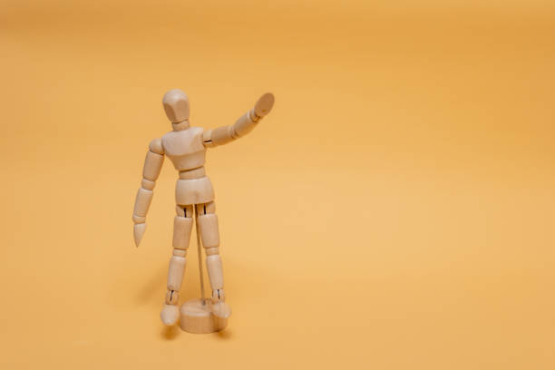 istock Prototype for drawing standing, raising hands in the background. 1339963296