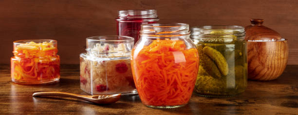 istock Fermented, probiotic food rustic panorama. Canned vegetables 1339963680