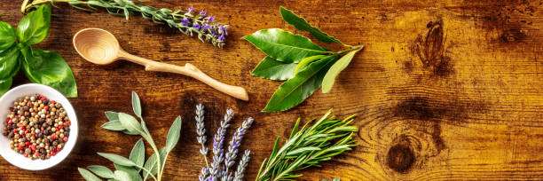 istock Culinary herbs panorama with bay leaf and a place for text, shot from the top 1339963709