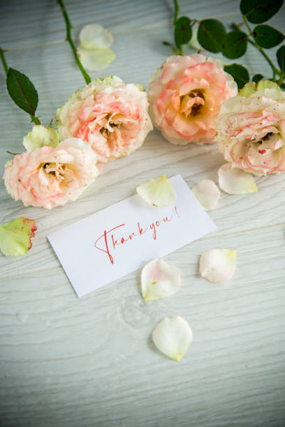 istock bouquet of beautiful orange roses on table 1339968595