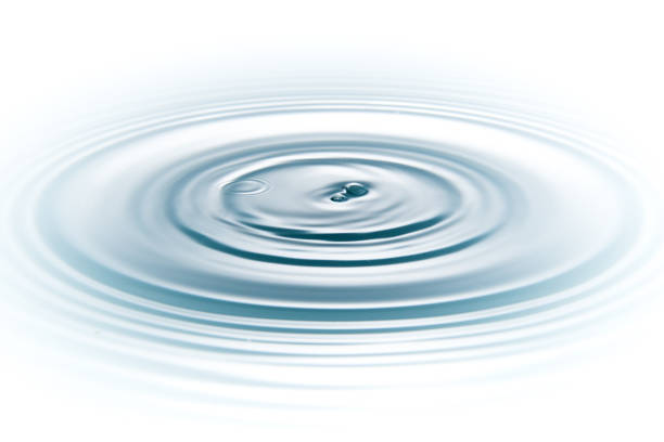 istock drop of water with rippled 1339969633
